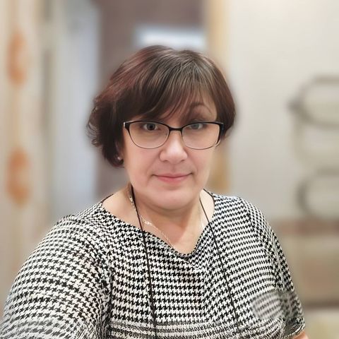Неля К